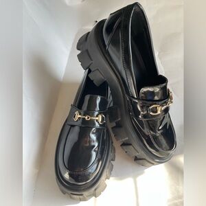 Princess Polly Penny Lane black platform loafers gold horsebit patent leather